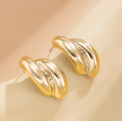 Double Twist Dome Huggie Hoops — Gold